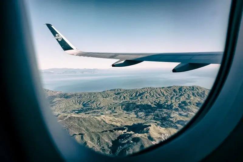 Airplane flying over the mountains
